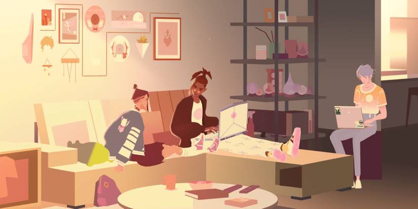 Itsumi, Carter, and Luca working together on laptops in a living room in We Are OFK