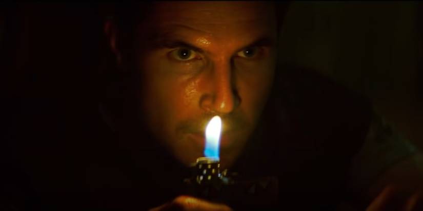 RE Movie Chris With Lighter Cropped