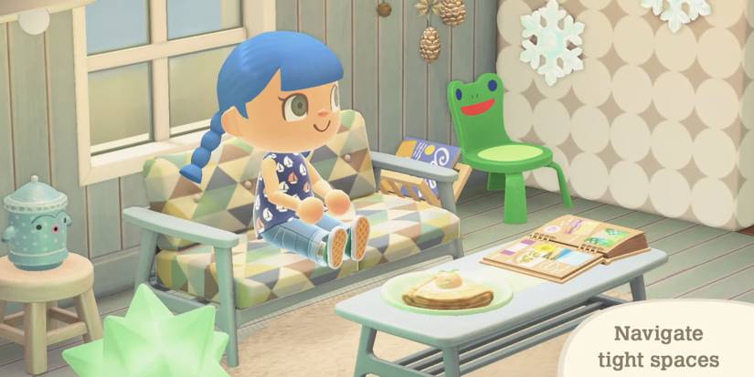 Character sitting in room with froggy chair in the corner. 