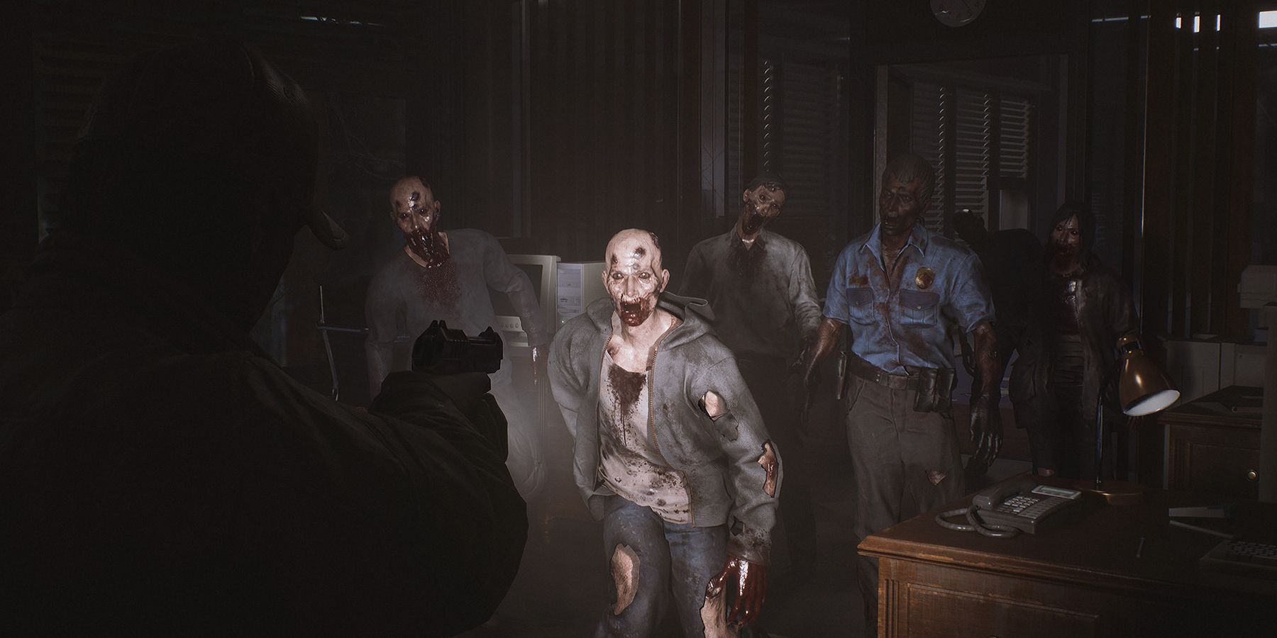 A character encounters a room full of zombies in The Day Before.
