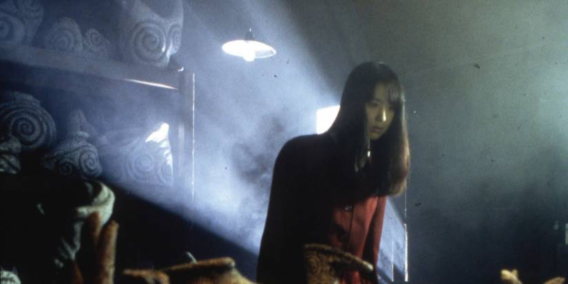 A girl surrounded by strange, spiral objects in Uzumaki