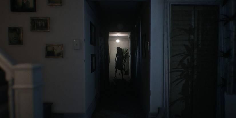 Visage horror game creature standing in hallway