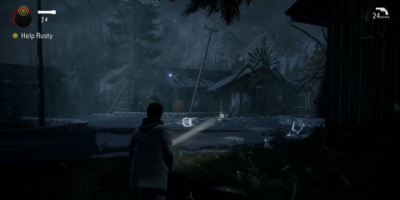 alan wake remastered alan with flashlight during episode 2 to lovers peak