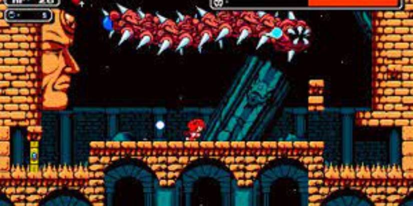 Screenshot of Arias against the red dragon on Astalon: Tears of the Earth.