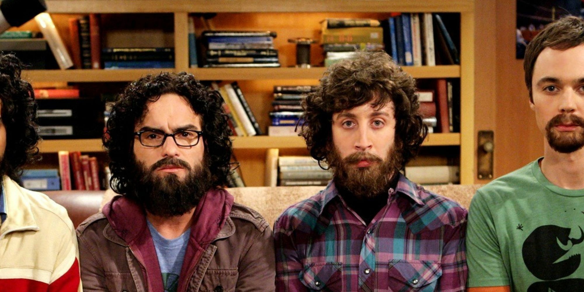 Raj, Leonard, Howard, and Sheldon sit on the couch with beards in The Big Bang Theory