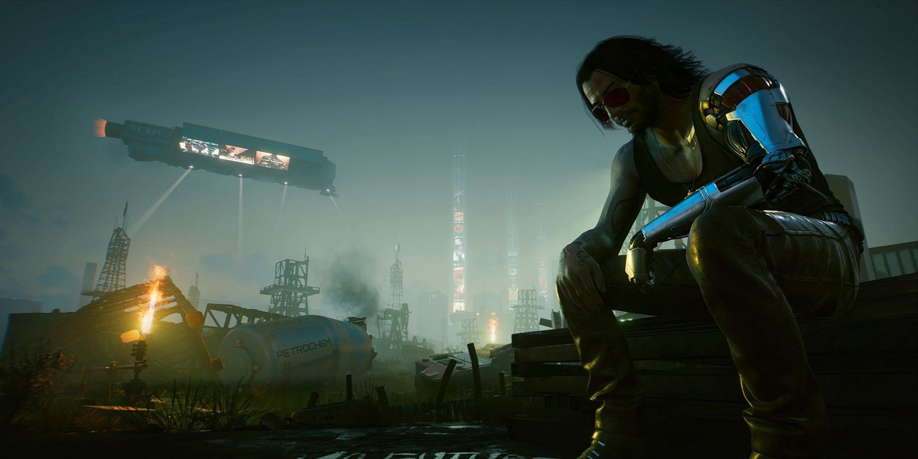 Image from Cyberpunk 2077 showing a forlorn Johnny Silverhands sat down outside.