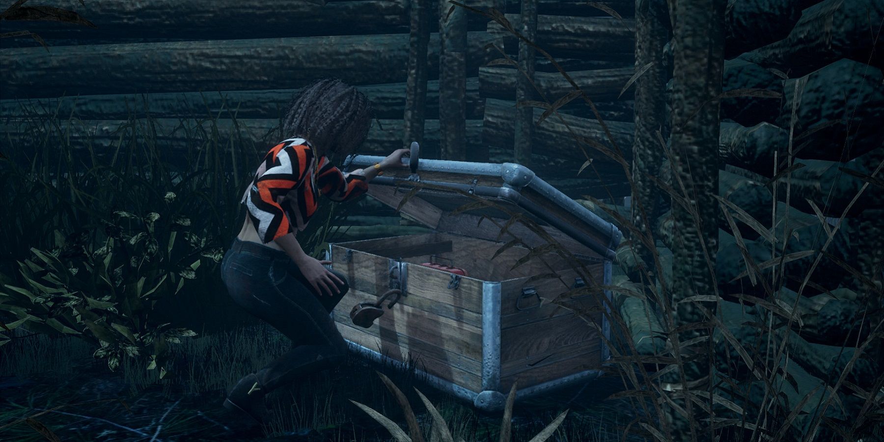 Screenshot from Dead by Daylight showing a survivor opening a chest.