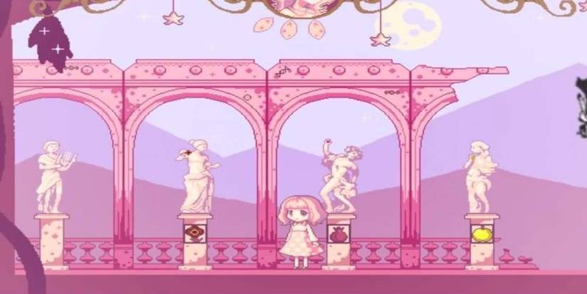 Pink room with Greek statues. 