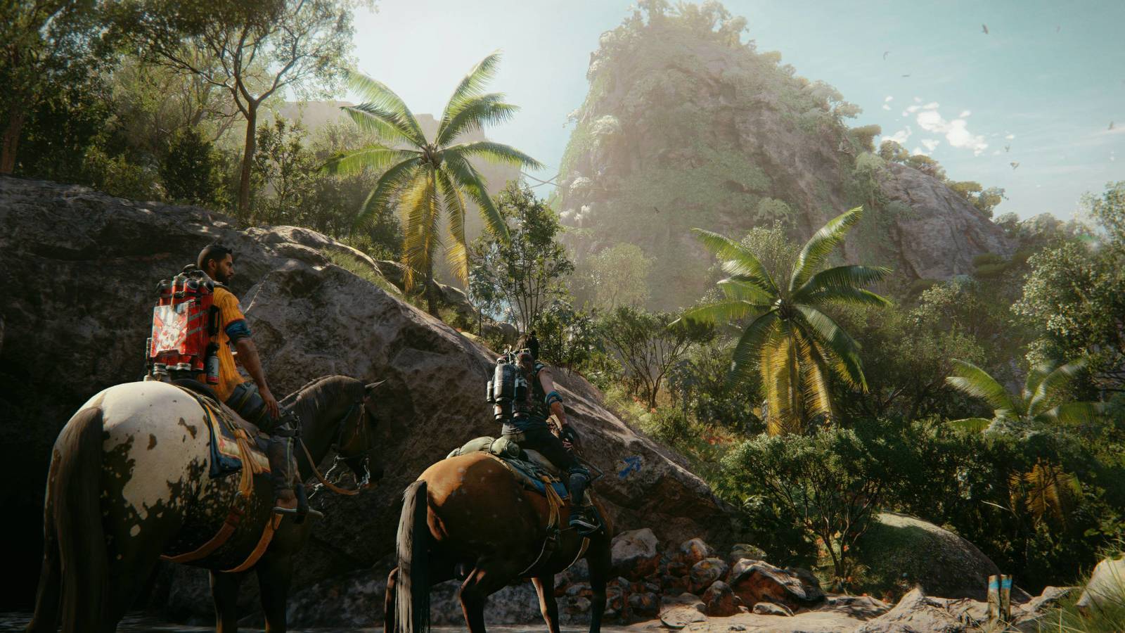 far-cry-6-dani-and-companion-on-horseback-by-mountains
