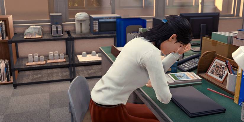 lost-judgment-chapter-4-red-knife-02-sawa-at-her-desk