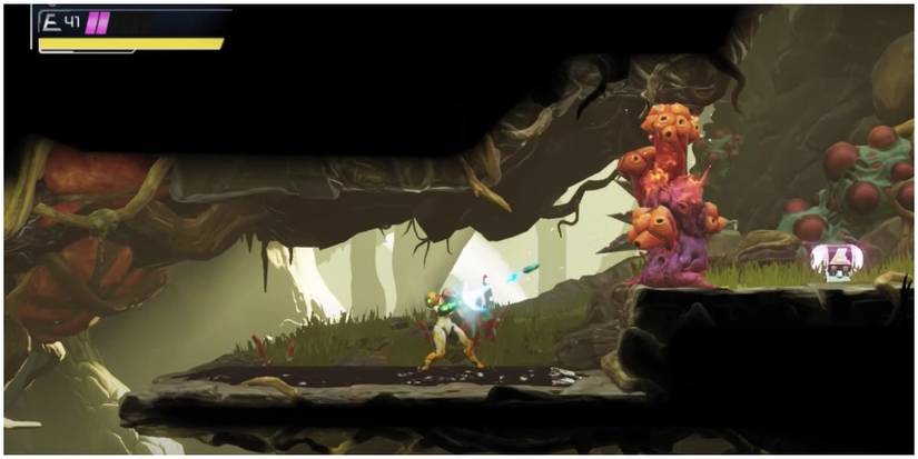 metroid dread samus shooting fire plant enky with ice missile