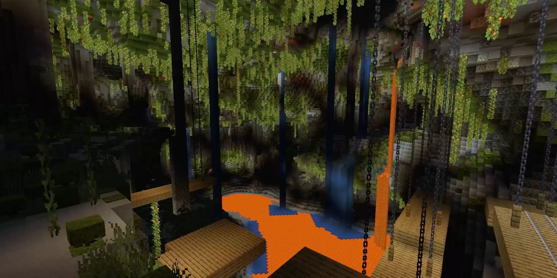 Minecraft screenshot showing a cave overgrown with vines. Abandoned mineshafts stretch out across a lava lake.