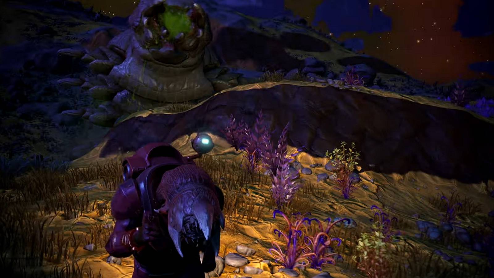 A screenshot from No Man's Sky showing a player running away from an emerging sandworm.