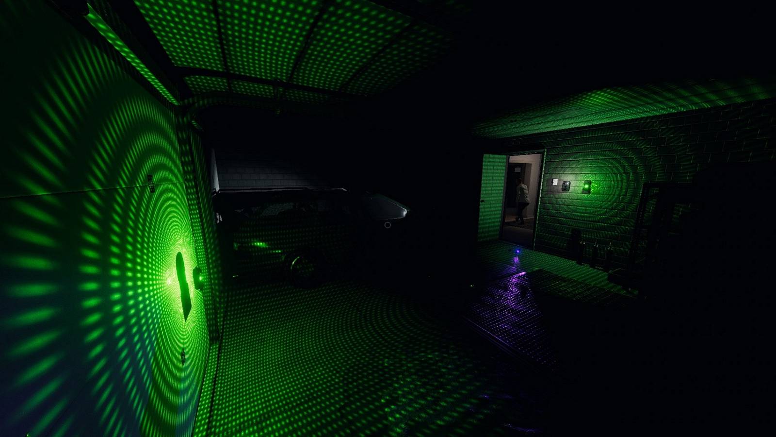 Screenshot from Phasmophobia showing the DOTS projector glowing green.