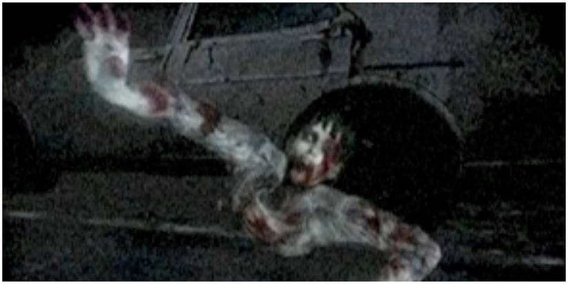 Ghost crawling out from under car. 