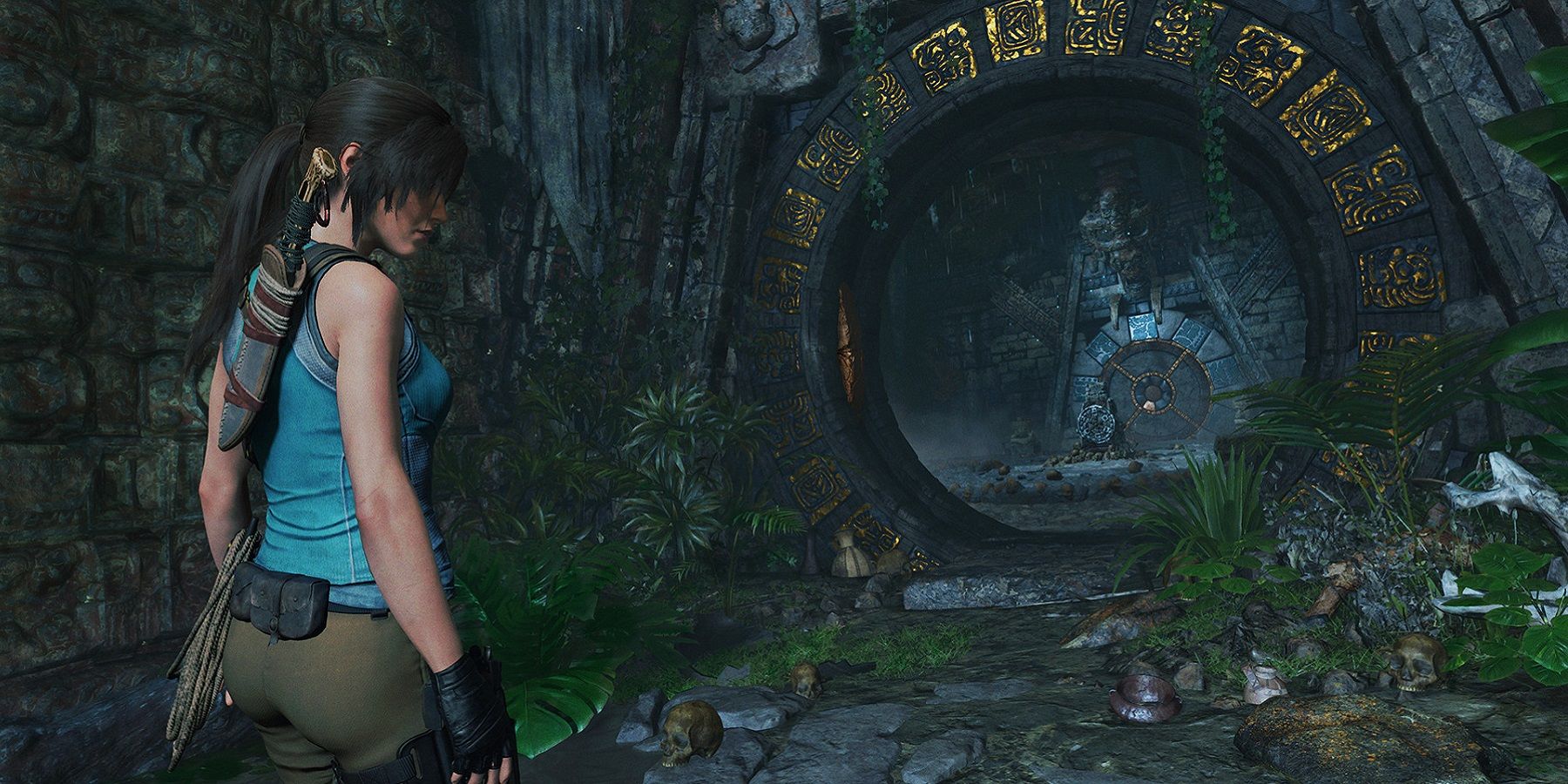 Image from Shadow of the Tomb Raider showing Lara about to enter an open tomb.