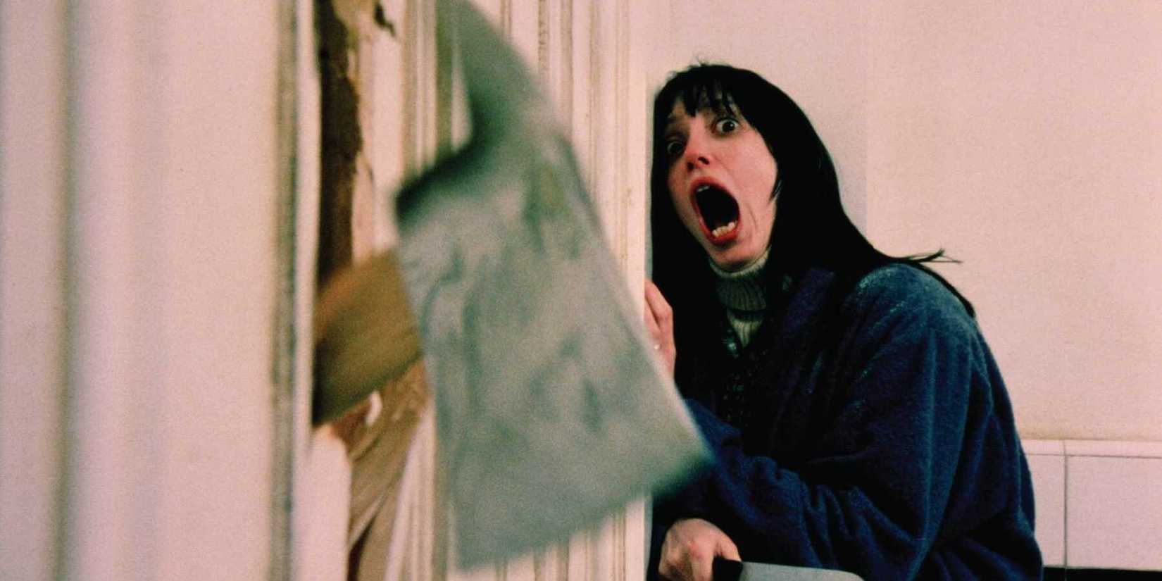 wendy screaming as jack breaks through the door with an axe