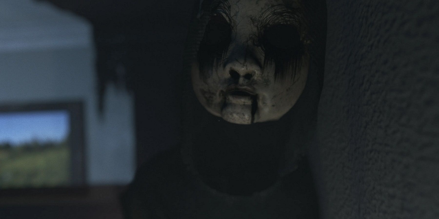 Screenshot from Visage showing a close-up of a ghostly face.