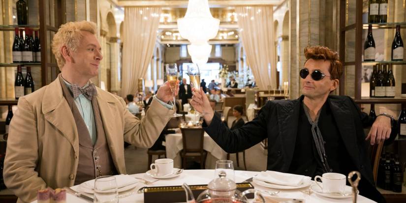 Aziraphale and Crowley drinking champagne at the Ritz 