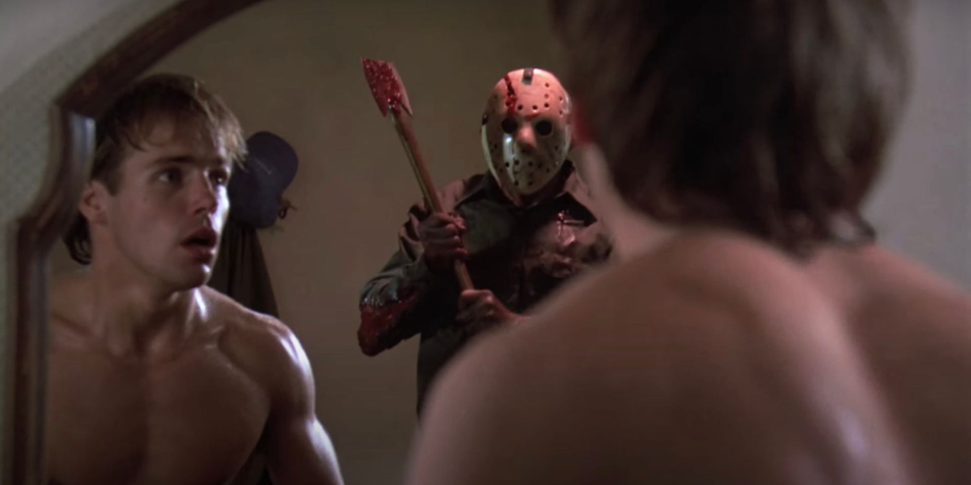 Jason from Friday the 13th reflected in the mirror