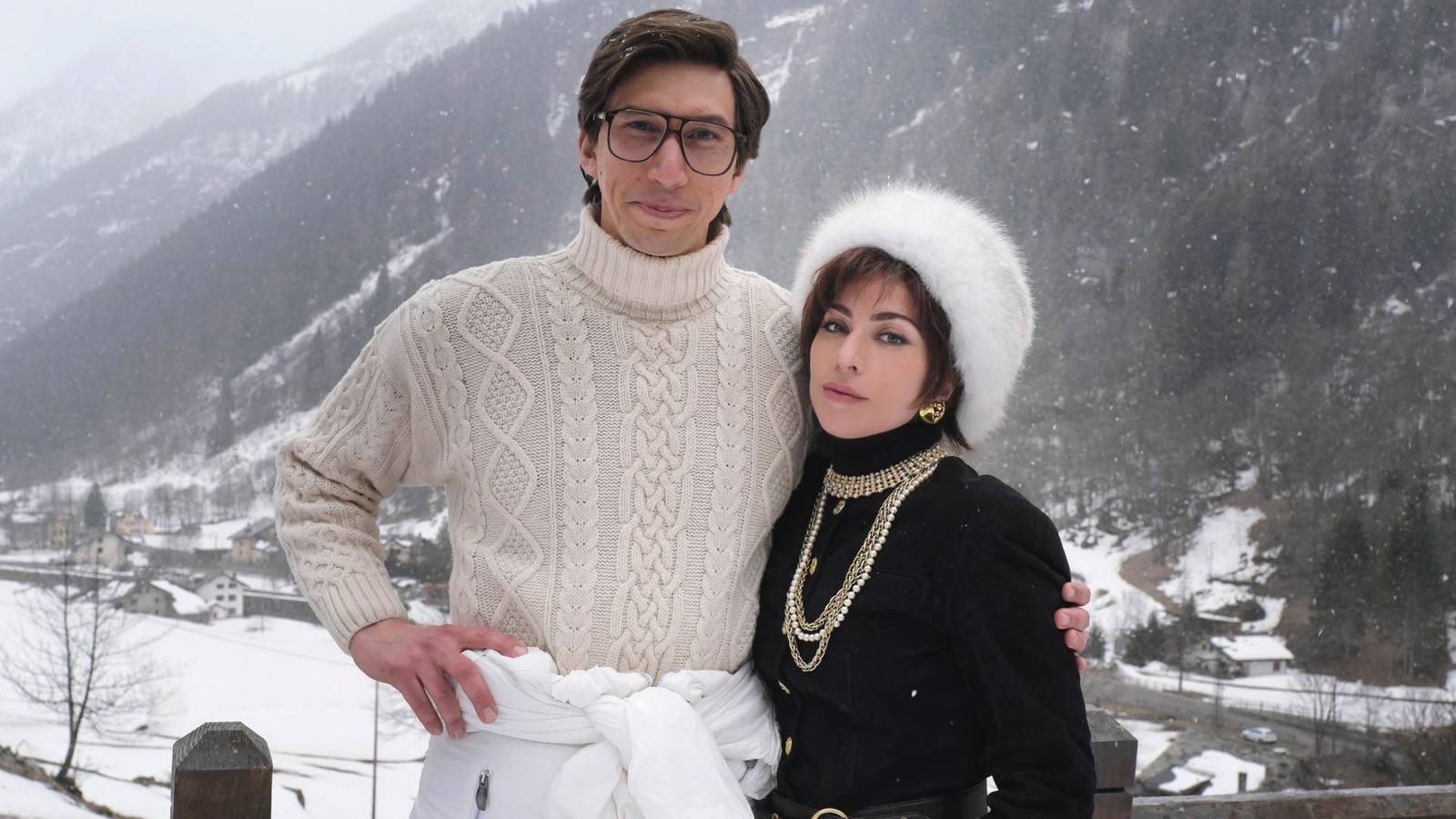 Adam Driver and Lady Gaga at a cabin in the snow in House of Gucci