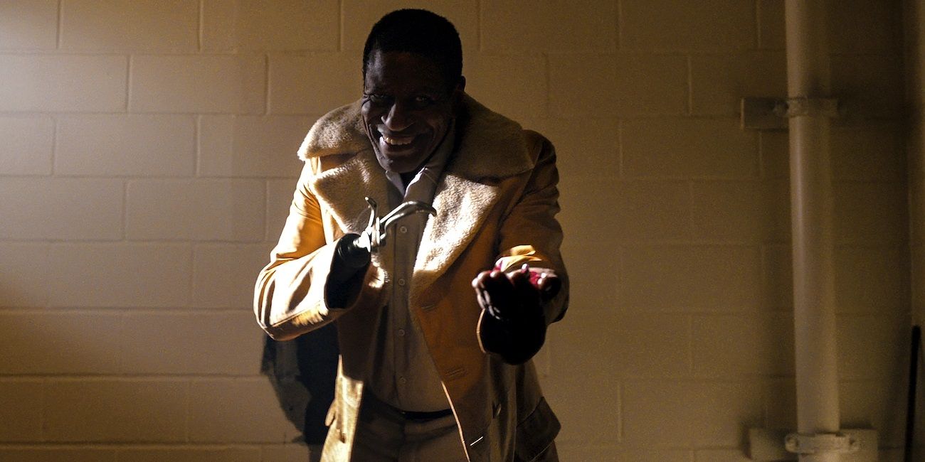 Candyman offering candy in the Candyman reboot