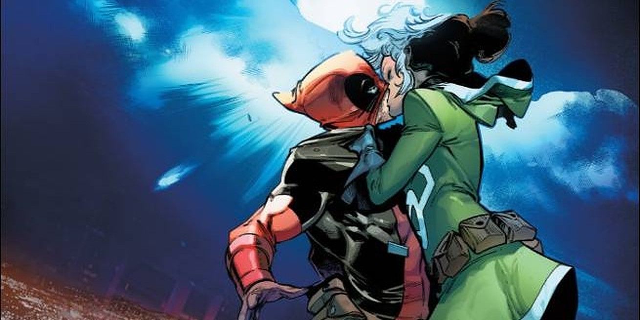 Deadpool and Rogue kiss