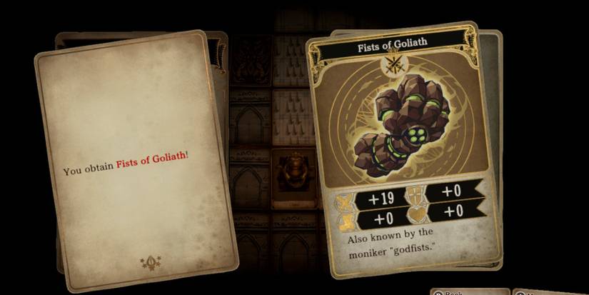 a rock hand with green links and dots between the brown pieces of rock 