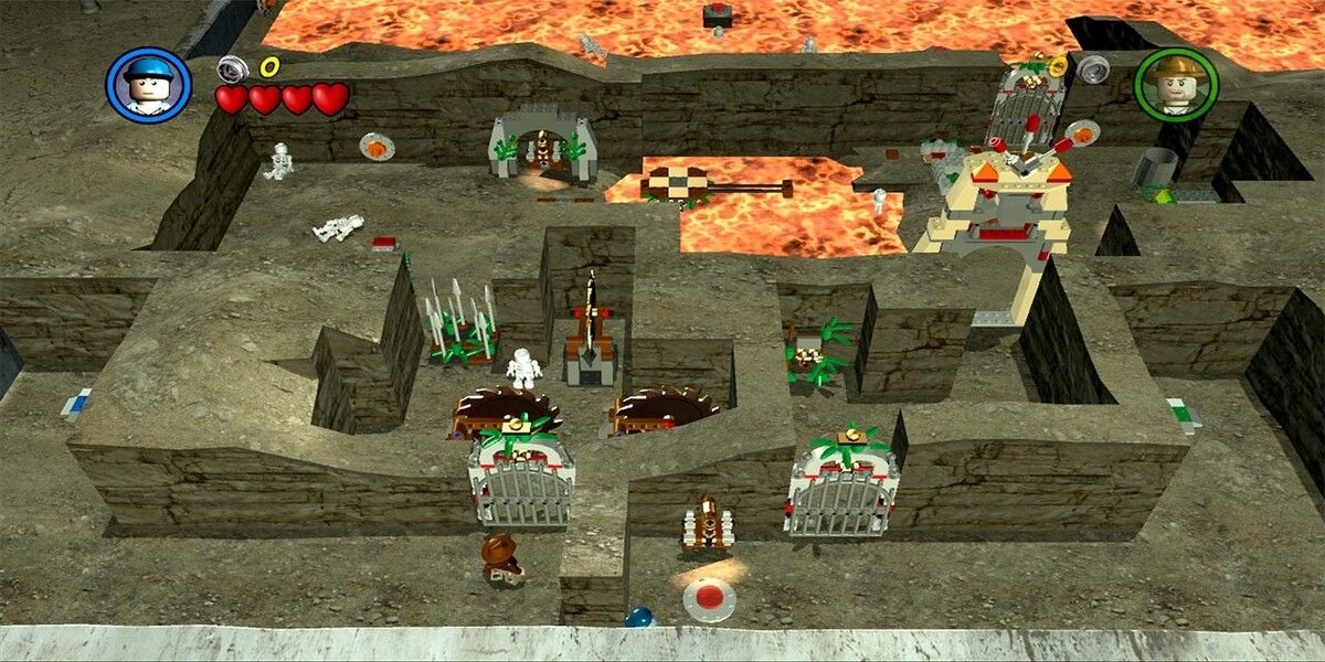 Lego Indiana Jones 2 The Adventure Continues Indiana Jones Maze Gameplay Screenshot with many traps and skeletons