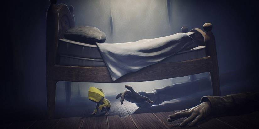 Hiding under a bed in Little Nightmares
