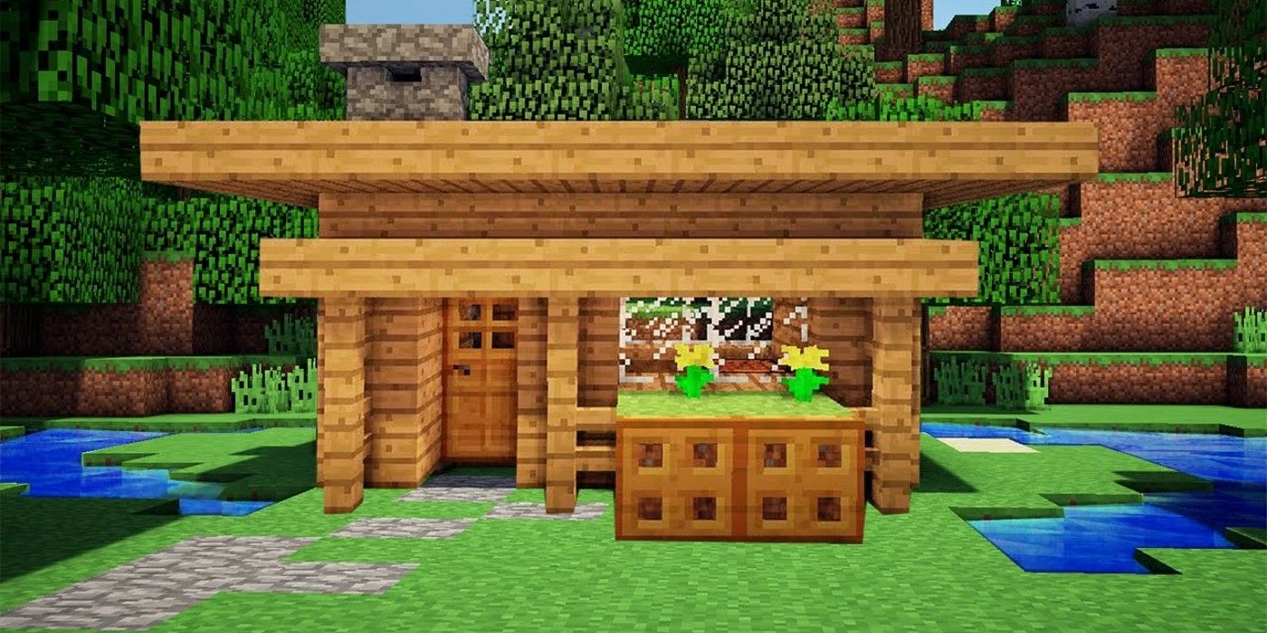 Minecraft wooden house in grassy valley