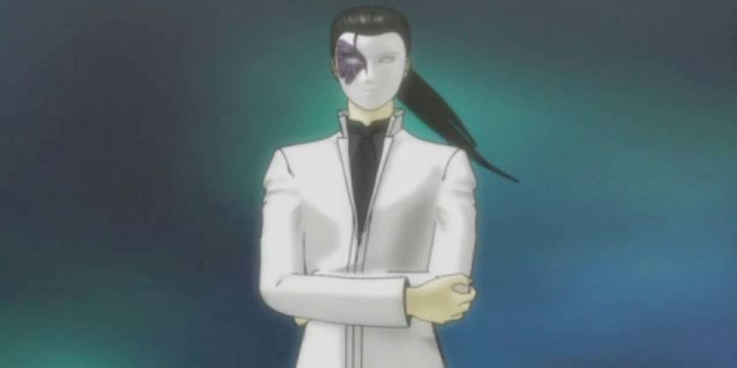 Philemon standing with his arms folded in an early cutscene from Revelations: Persona/Megami Ibunroku Persona