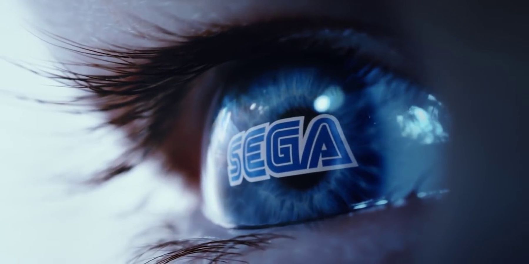 The Sega logo appearing on a person's eye