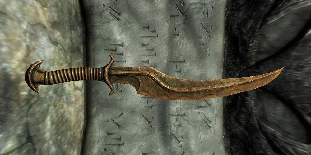 Skyrim Dragon Priest Dagger In Front Of a Word Wall