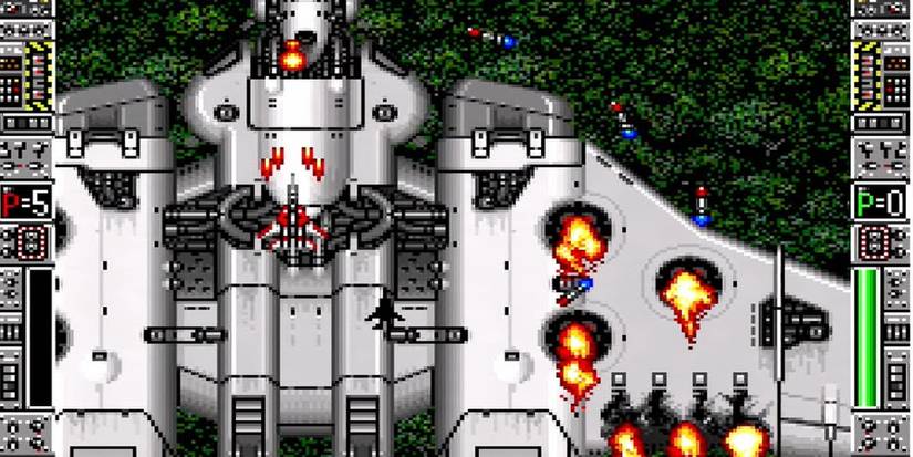 massive enemy ship in flames in Strike Gunner SNES