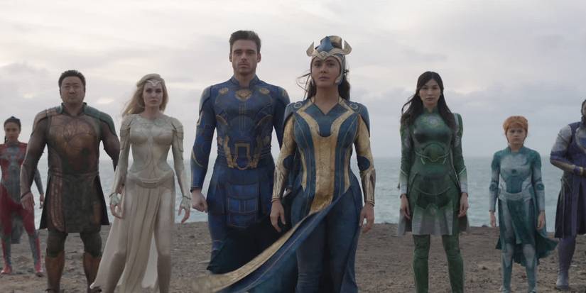 The Eternals standing in front of the ocean