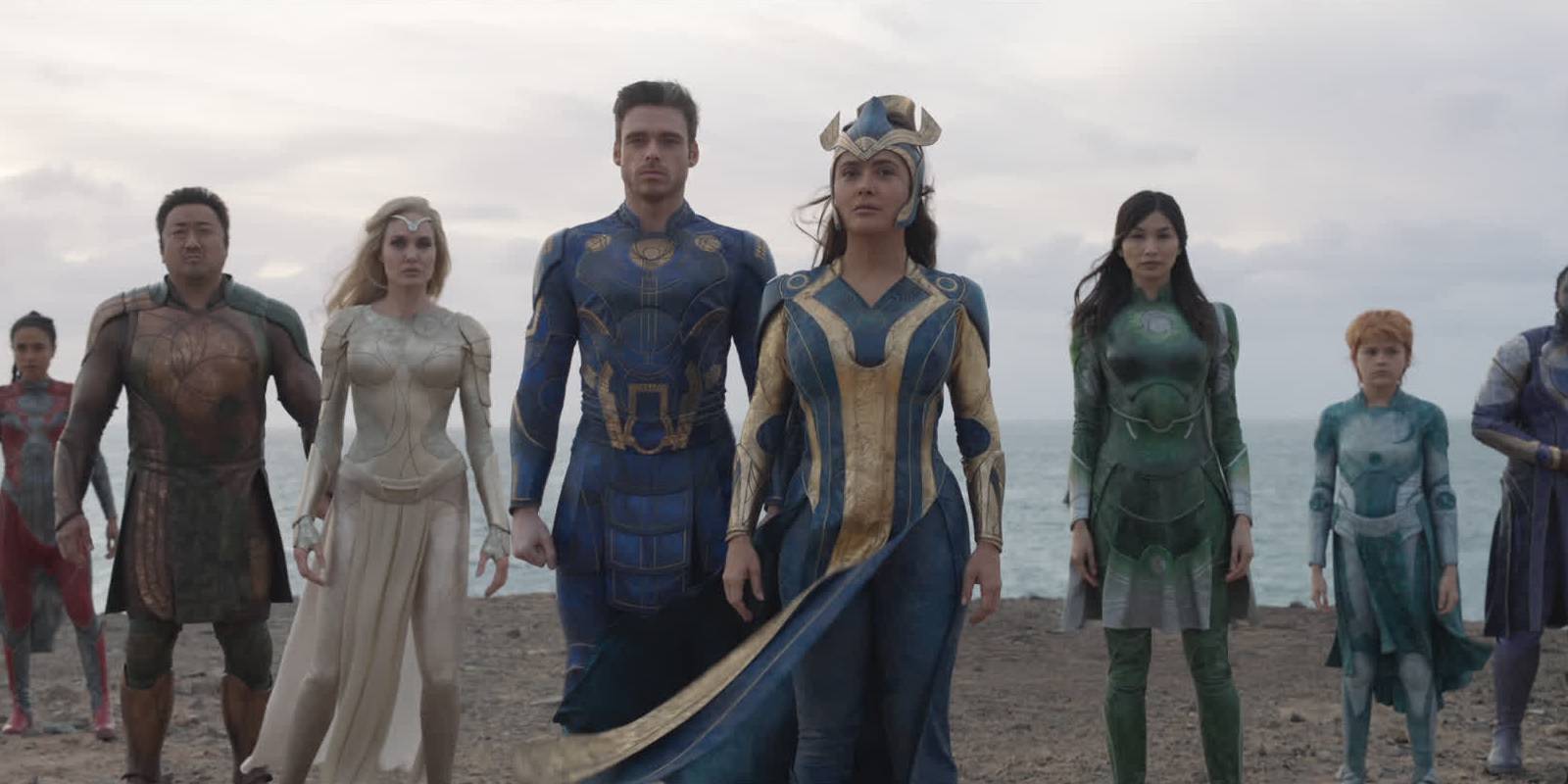 The Eternals standing in front of the ocean