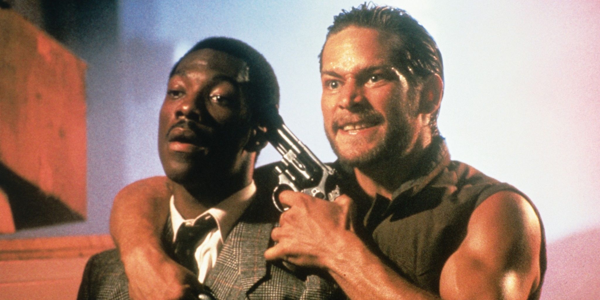 The villain holds Eddie Murphy at gunpoint in 48 Hrs