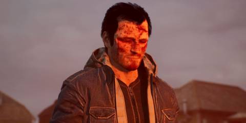 A heavily wounded Isaac grimacing and lit by the burning building in the teaser trailer for Wronged Us