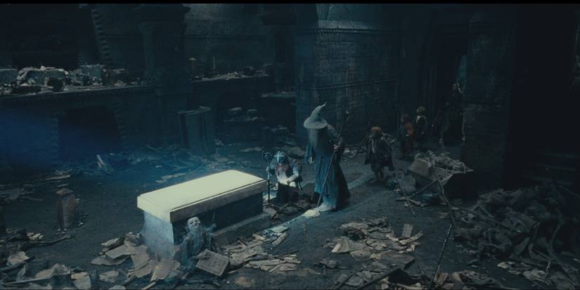 gimli kneeling at balin's tomb