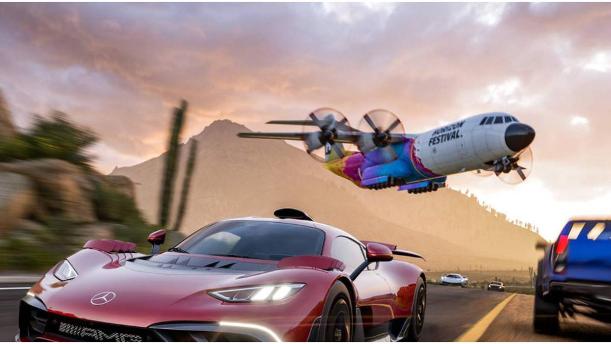 cars with a plane flying in the background 