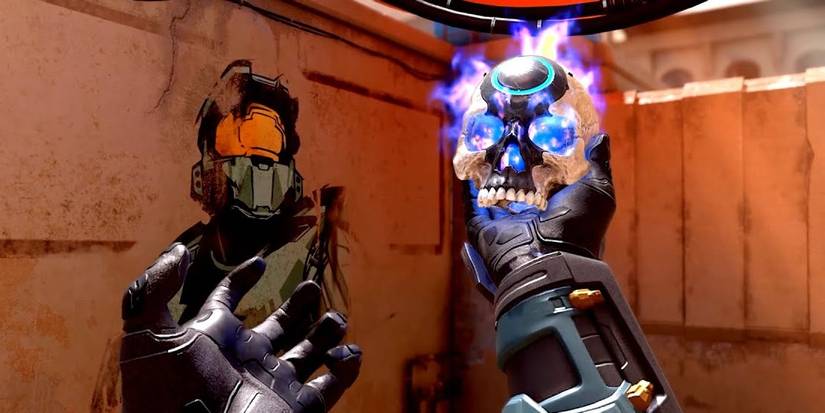 halo oddball player holding the ball in first person with master cheif in the background 