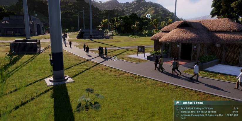 jurassic-world-evolution-2-guests-next-to-bathroom