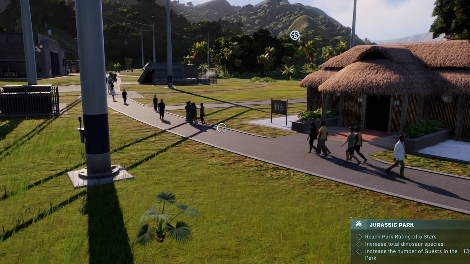 jurassic-world-evolution-2-guests-next-to-bathroom