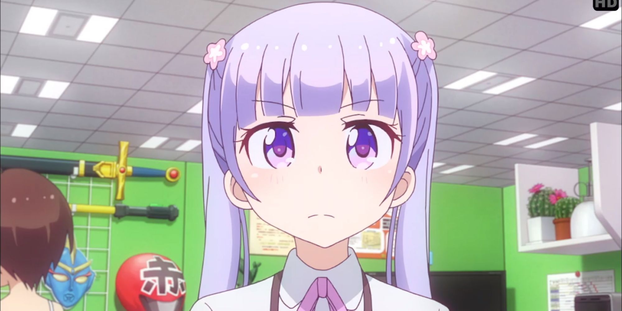 Close-up of a character from New Game anime in an office