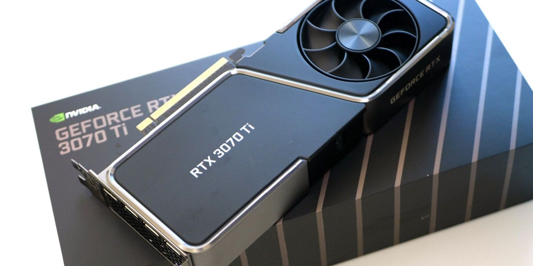 Photo of an Nvidia RTX 3070 Ti graphics card on top of its display box.