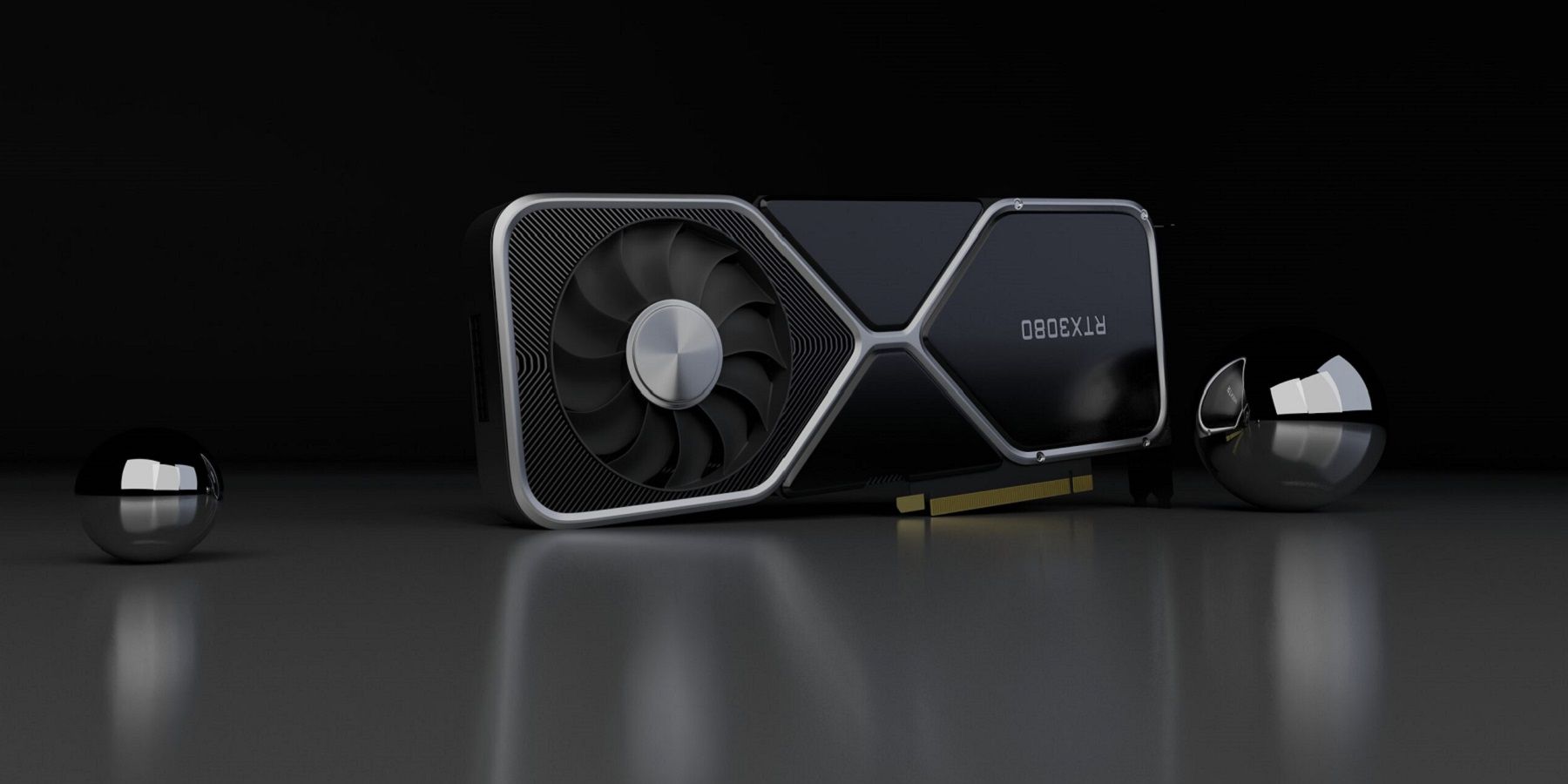 A photo of an Nvidia RTX 3080 GPU with chrome balls either side of it.