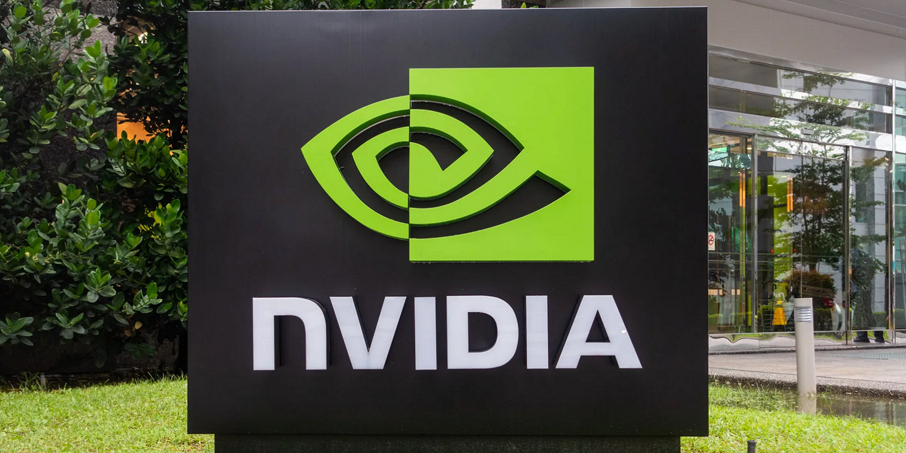 Photo of the Nvidia logo outside a corporate building.