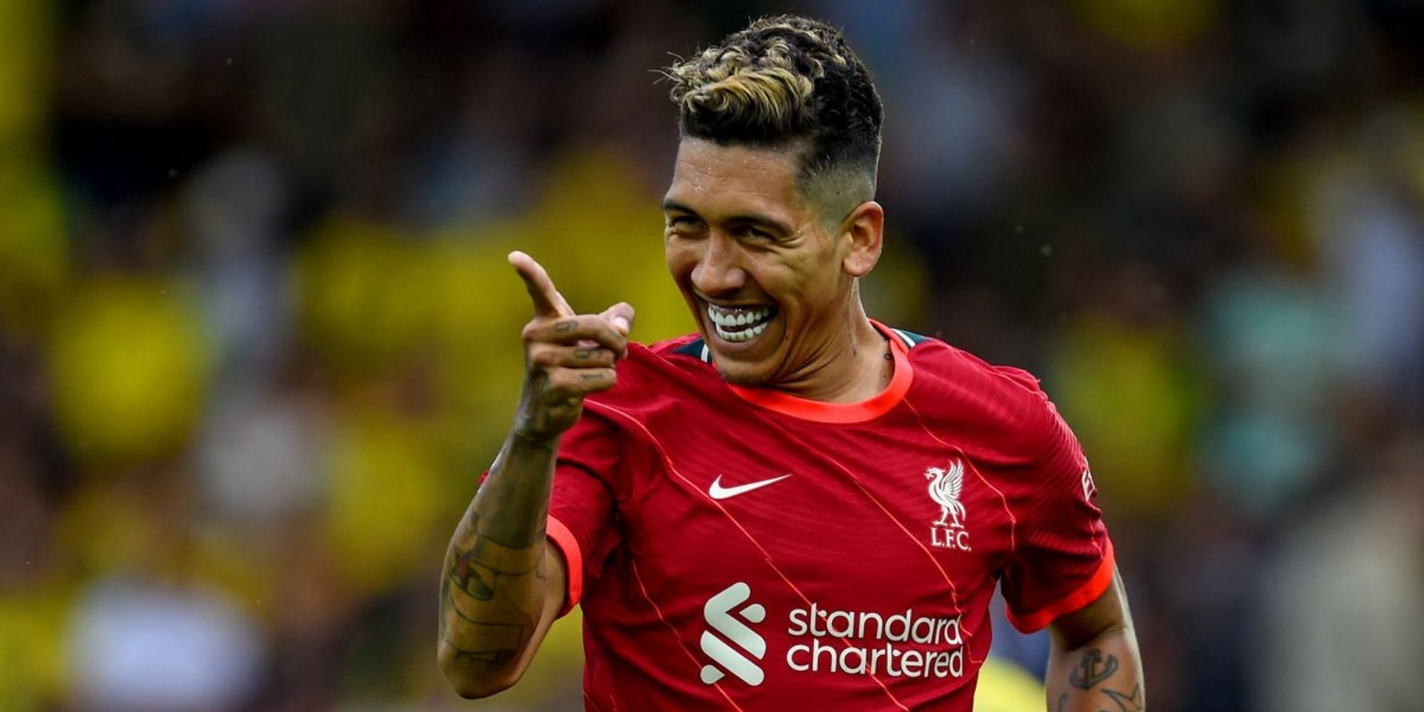 Official image of Roberto Firmino, a professional footballer.