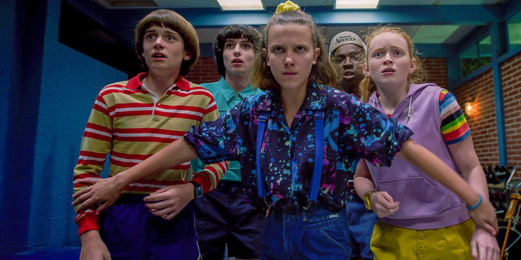 Will, Mike, Eleven, Lucas and Max looking scared in Stranger Things